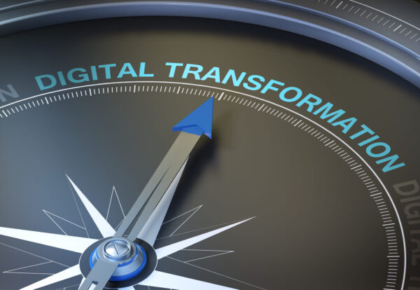 digital transformation Image of compass pointing North towards Transformation